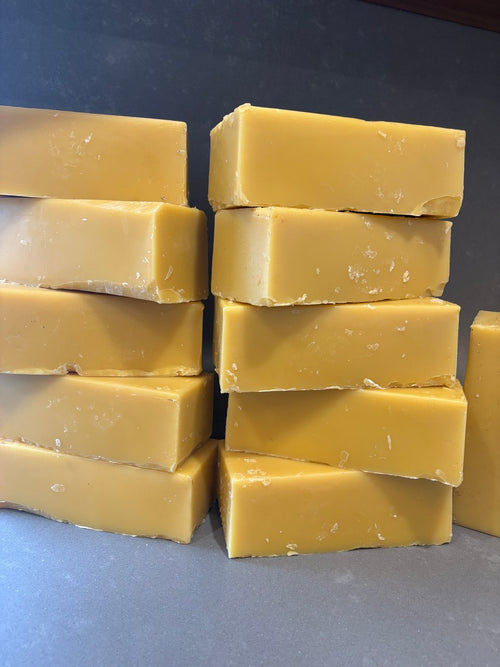 Stacked blocks of filtered beeswax