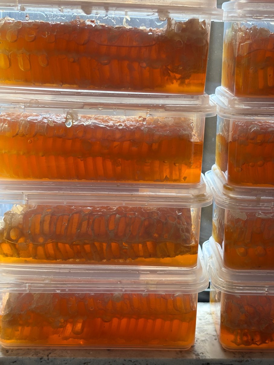 Comb honey in clear packs, stacked