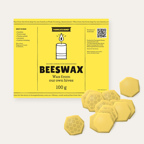 Beeswax pressed into small hexagon tablets, some with a honeycomb pattern, beside the lemon beeswax label (a render of the new label, coming this season)