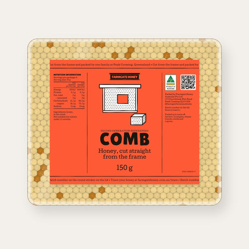 Comb honey in a clear tub seen from above, the tomato comb label on the lid (a render of the new label, coming this season)