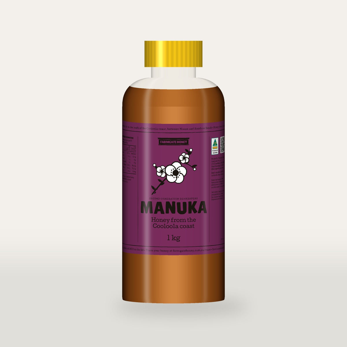 Queensland Manuka Honey in a clear squeeze bottle, the pink manuka label with a flowering tea tree drawn on the front (a render of the new label, coming this season)