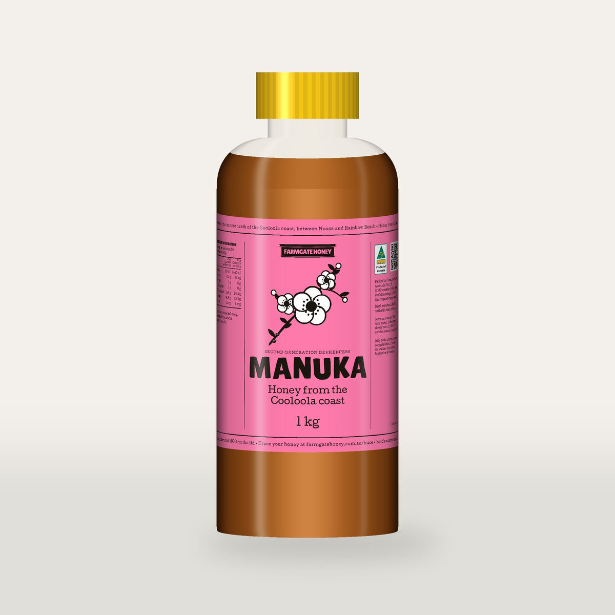Queensland Manuka Honey in a clear squeeze bottle, the pink manuka label with a flowering tea tree drawn on the front (a render of the new label, coming this season)